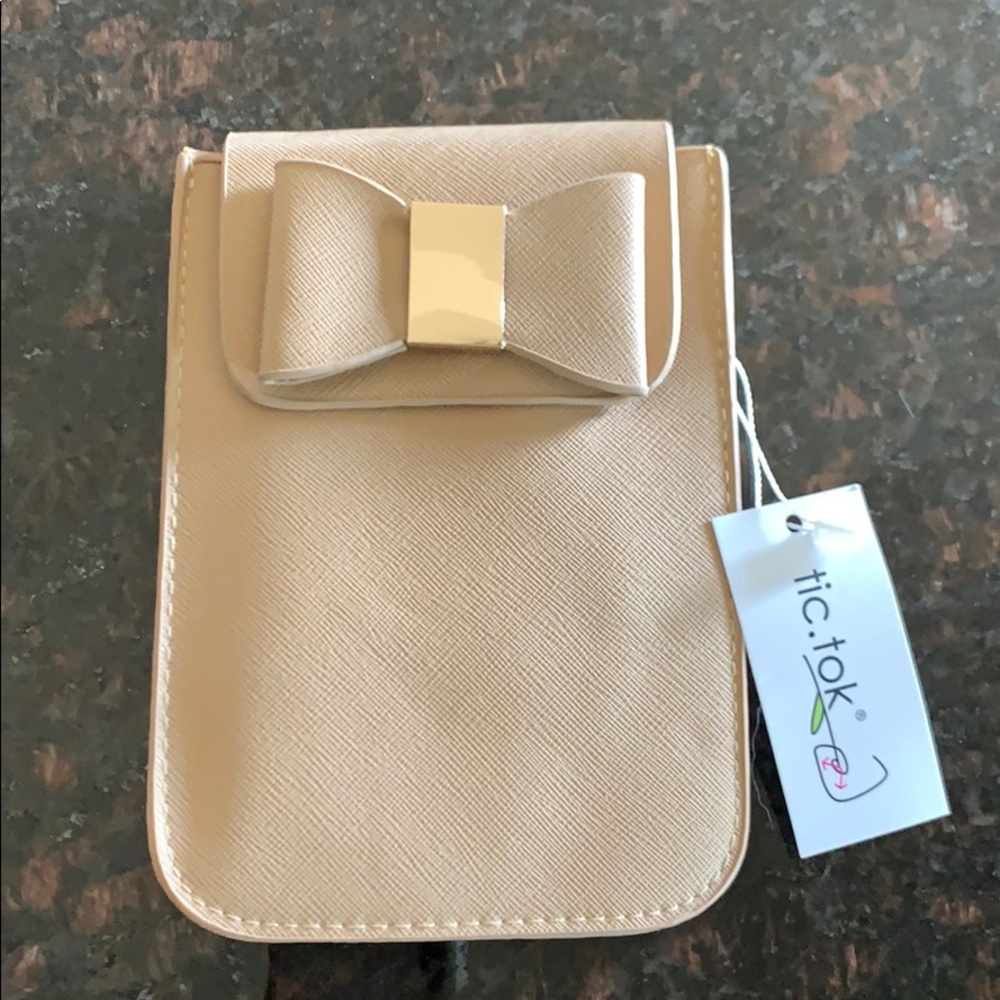 Small phone sized purse it’s a bow